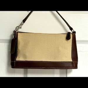 Authentic Coach brown leather and beige wristlet.